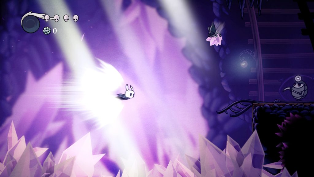 A screenshot of Hollow Knight, with the knight dashing across a purple cave embedded with sharp crystals