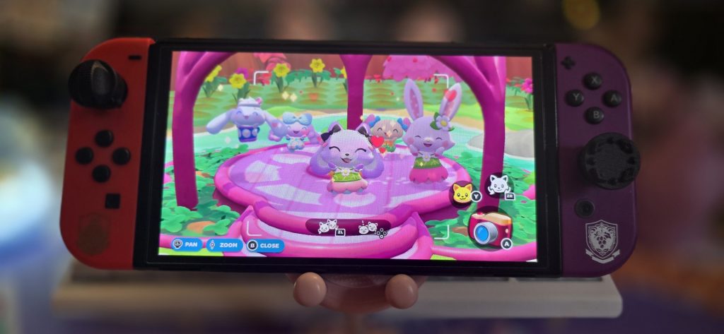 A Nintendo Switch with added attachments to improve accessibility, provided by Thumb Soldiers.